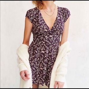 Purple floral romper size small